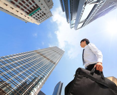 Successful Business Man Outdoors Next To Office Building